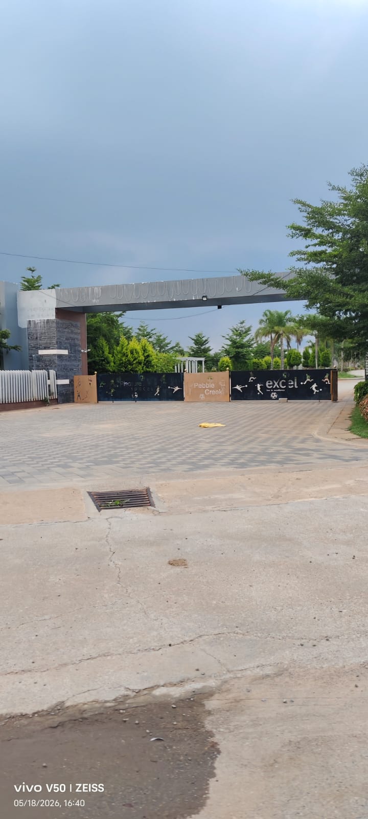 Wide entry and exit arch at Infenity Pebble Creek - Sarjapura-Attibele road